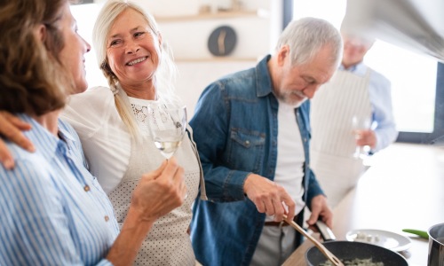 a group of friends cooking together